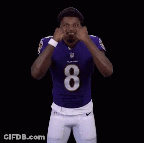 Man In Ravens Jersey Flexing Muscles GIF