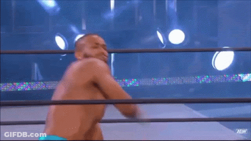 Man In Ravens Jersey Flexing Muscles GIF