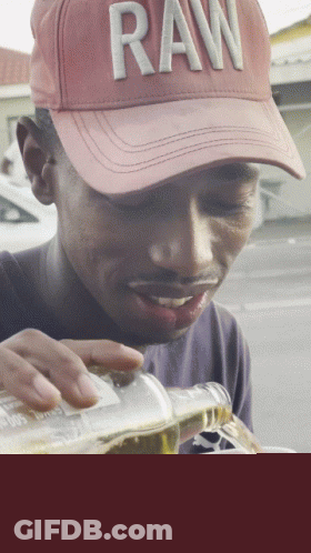 Man In Raw Hat Pouring Beer GIF