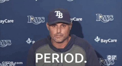 Man In Rays Hat Drinking From Green Cup GIF