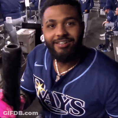 Man In Rays Jersey Holding Bat GIF