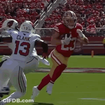 Man In Red 49Ers Jersey Running With Football GIF