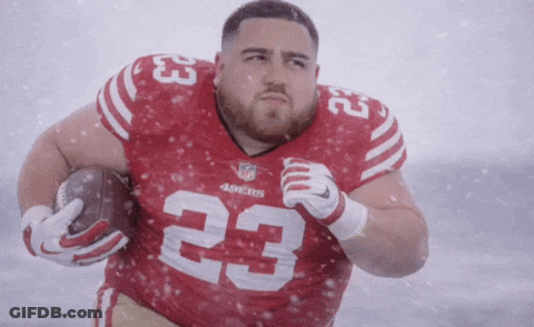 Man In Red 49Ers Jersey Running With Football GIF