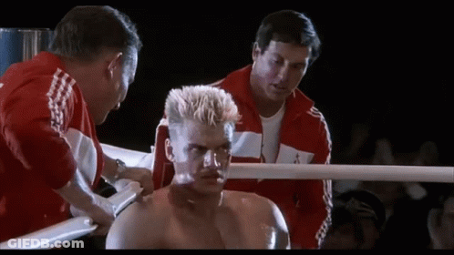 Man In Red Adidas Jacket And Boxer In Ring GIF
