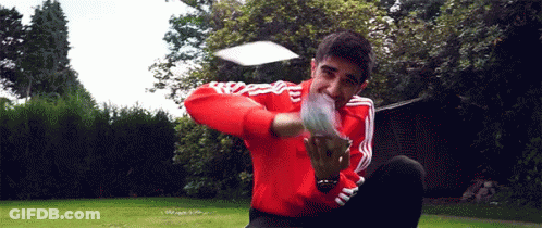 Man In Red Adidas Jacket Throwing Frisbee GIF