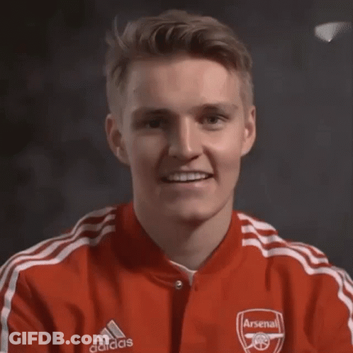 Man In Red Adidas Jacket With Arsenal Logo GIF