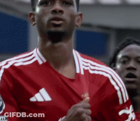 Man In Red Adidas Jersey Holding Medal GIF