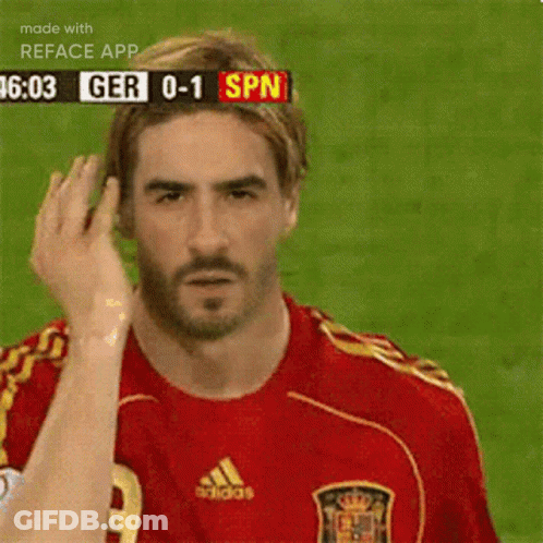 Man In Red Adidas Jersey Stands On Field GIF