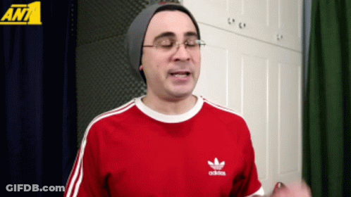 Man In Red Adidas Shirt And Beanie GIF