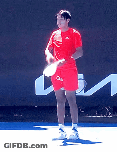 Man In Red Adidas Shirt Holding Tennis Racquet GIF
