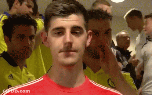 Man In Red Adidas Shirt In Front Of Crowd GIF