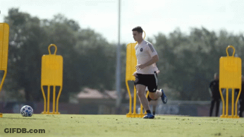 Man In Red Adidas Shirt Waving GIF