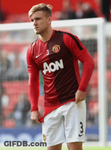 Man In Red And Black Aon Jersey GIF
