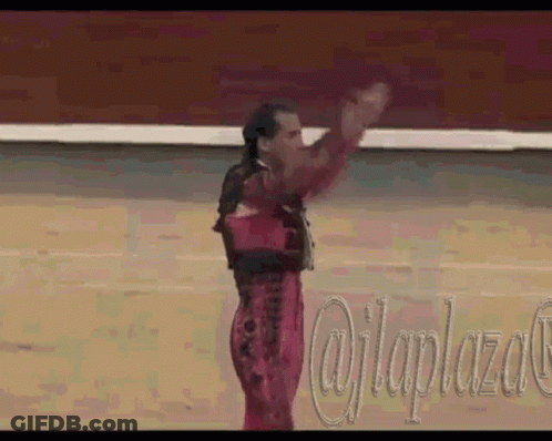 Man In Red And Black At @Ilaplaza Sign GIF