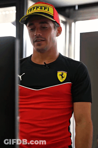 Man In Red And Black Ferrari Shirt GIF