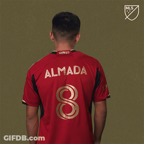 Man In Red And Black Jersey With MLS Logo GIF
