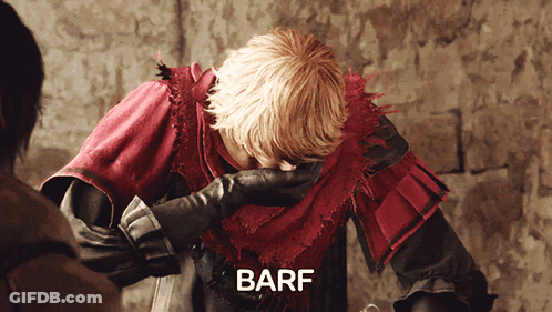 Man In Red And Black Outfit Covering Face Saying Barf GIF