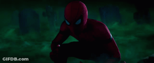 Man In Red And Black Spider-Man Costume In Dark Room GIF