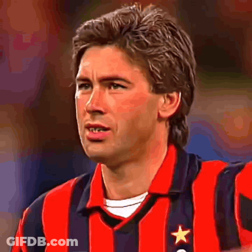 Man In Red And Black Striped Shirt With Star GIF