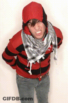 Man In Red And Black Striped Sweater And Scarf Making Funny Face GIF