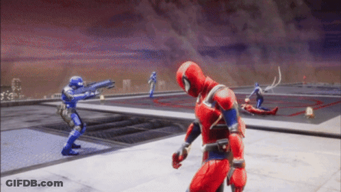 Man In Red And Blue Superhero Costume With Soldiers GIF