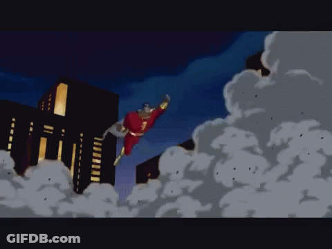 Man In Red And Gold Superhero Suit Flying GIF