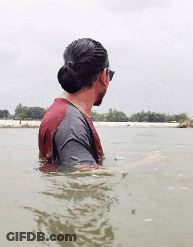 Man In Red And Grey Shirt In Water GIF