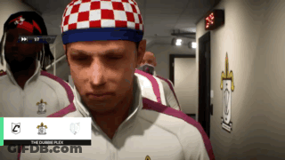 Man In Red And White Checkered Hat Hallway GIF