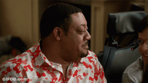 Man In Red And White Heart Shirt Smiling GIF