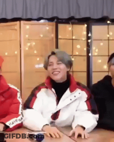 Man In Red And White Jacket Smiling GIF