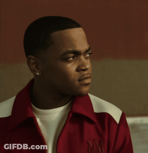 Man In Red And White Jacket With Letter M GIF
