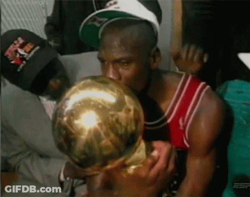 Man In Red And White Jersey Kissing Gold Trophy GIF