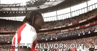 Man In Red And White Jersey Standing In Stadium GIF