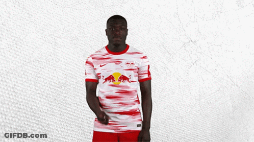 Man In Red And White Jersey With Bull GIF