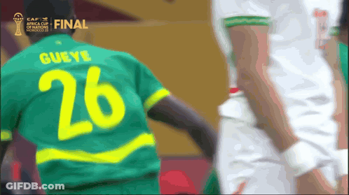 Man In Red And White Jersey With Bull GIF