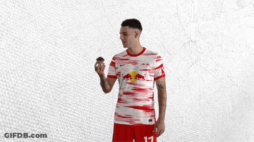 Man In Red And White Jersey With Bull GIF