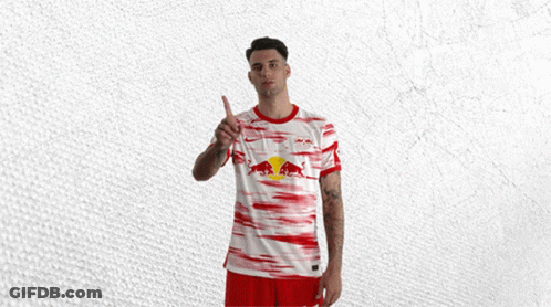 Man In Red And White Jersey With Red Bull GIF
