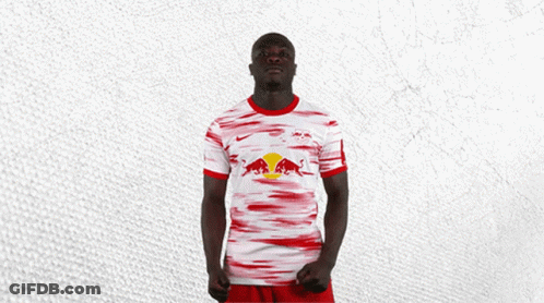 Man In Red And White Jersey With Red Bull GIF