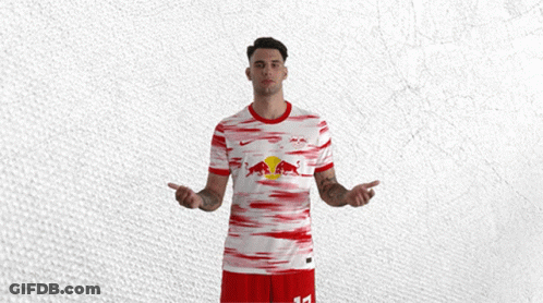 Man In Red And White Jersey With Red Bull GIF
