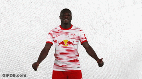 Man In Red And White Jersey With Red Bull Thumbs Up GIF