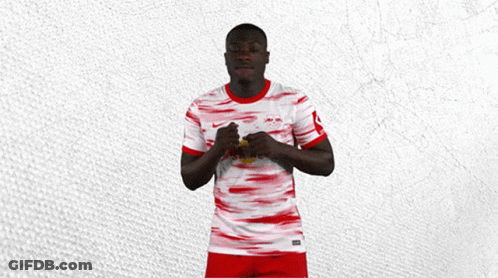 Man In Red And White Jersey With Red Bull GIF