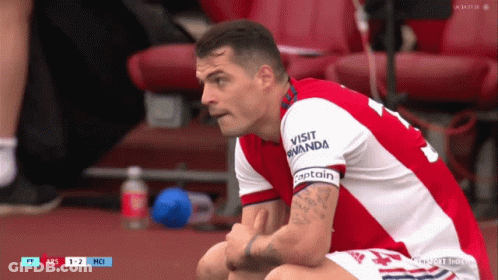 Man In Red And White Jersey With Visit Rwanda GIF