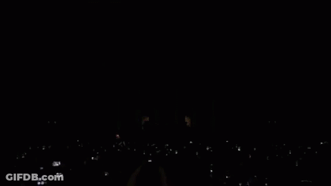Man In Red And White LNB Jersey In Crowd GIF