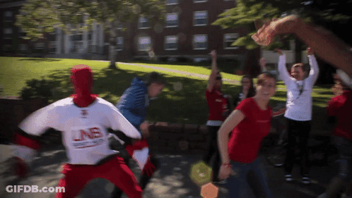 Man In Red And White LNB Jersey In Crowd GIF