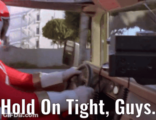 Man In Red And White Outfit Driving Car Saying Hold On Tight Guys GIF