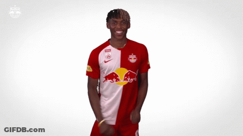 Man In Red And White Red Bull Jersey GIF