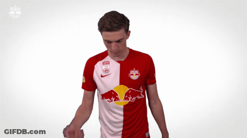 Man In Red And White Red Bull Jersey GIF