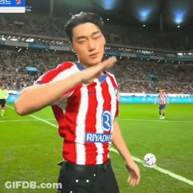 Man In Red And White Riyadh Jersey On Soccer Field GIF