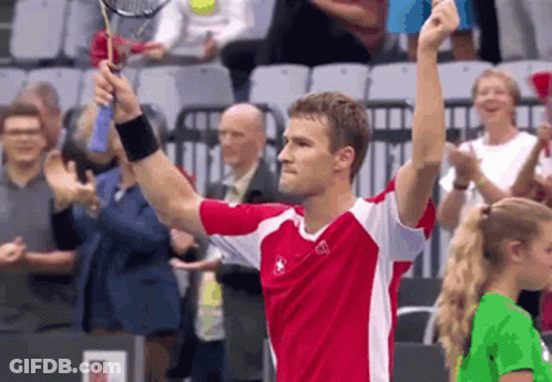 Man In Red And White Shirt Holding Tennis Racquet GIF