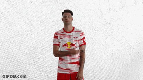 Man In Red And White Shirt With Bull GIF
